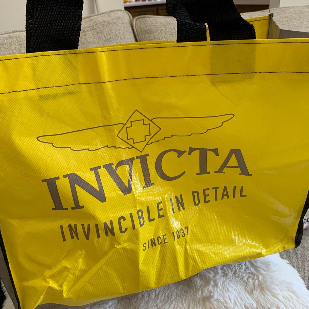 Invicta Yellow Tote Bag Purchased on Cruise Ship to store gifts. Like new.